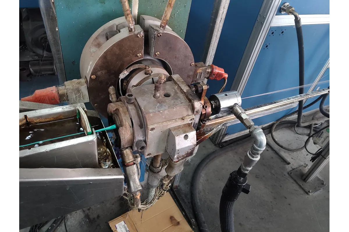 Fiber optic cable production equipment in the NetLast workshop