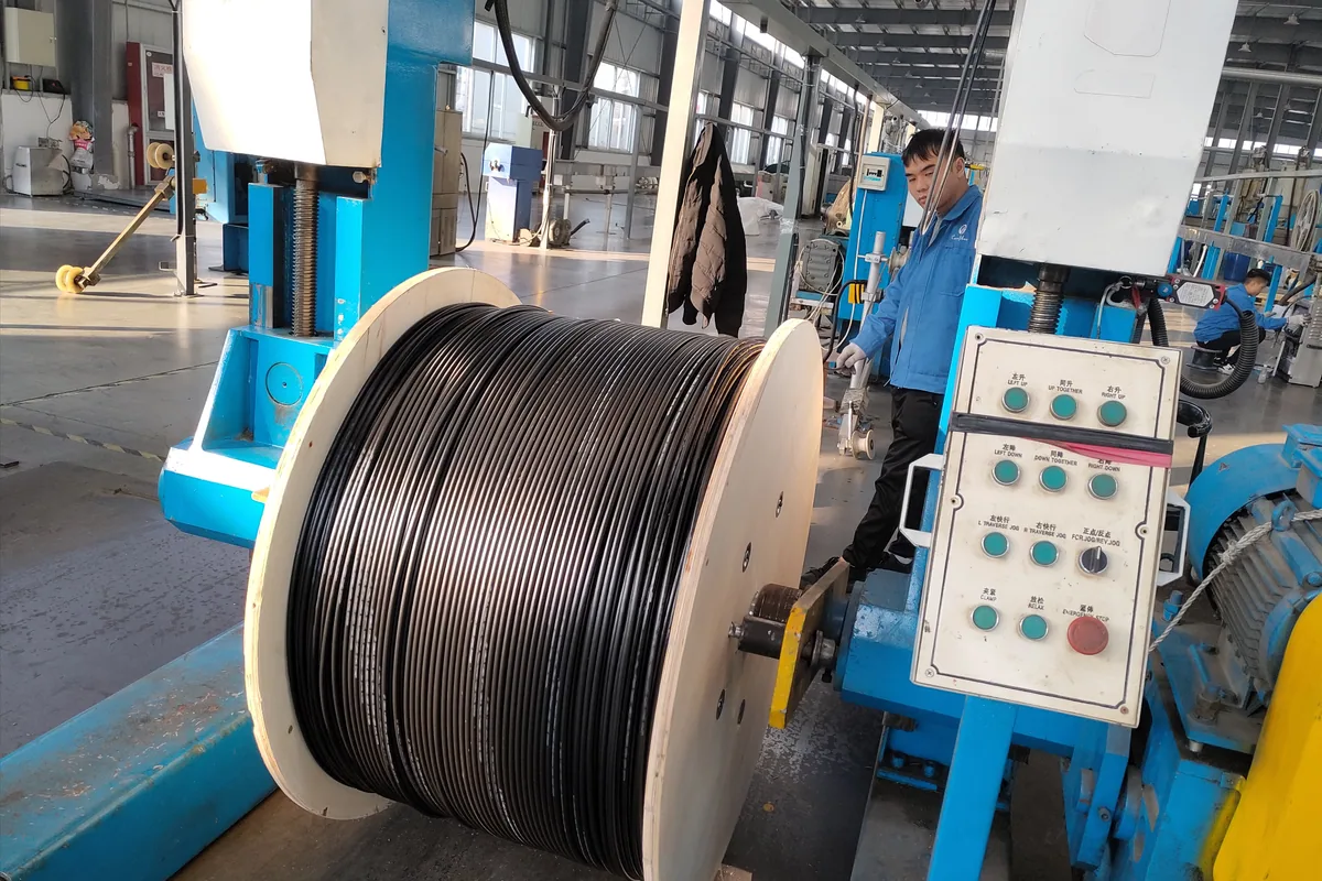 Fiber optic cable winding during production
