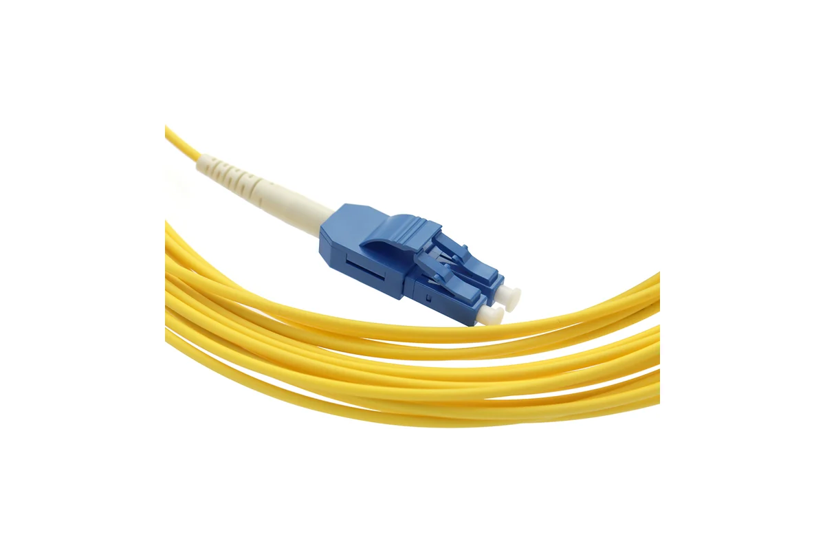 Yellow duplex LC UPC single-mode fiber optic patch cord on a white background