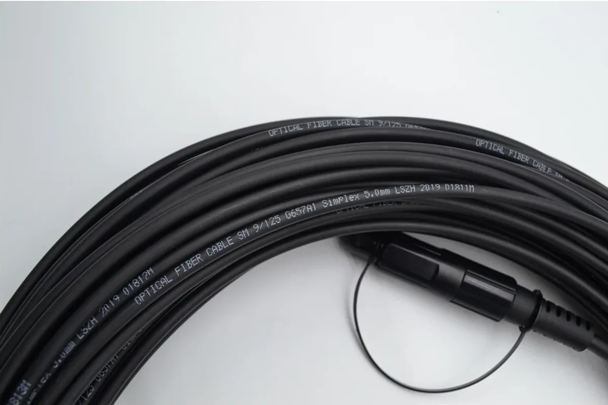 FTTH drop cable with printed cable marking and pre-connectorized outdoor termination