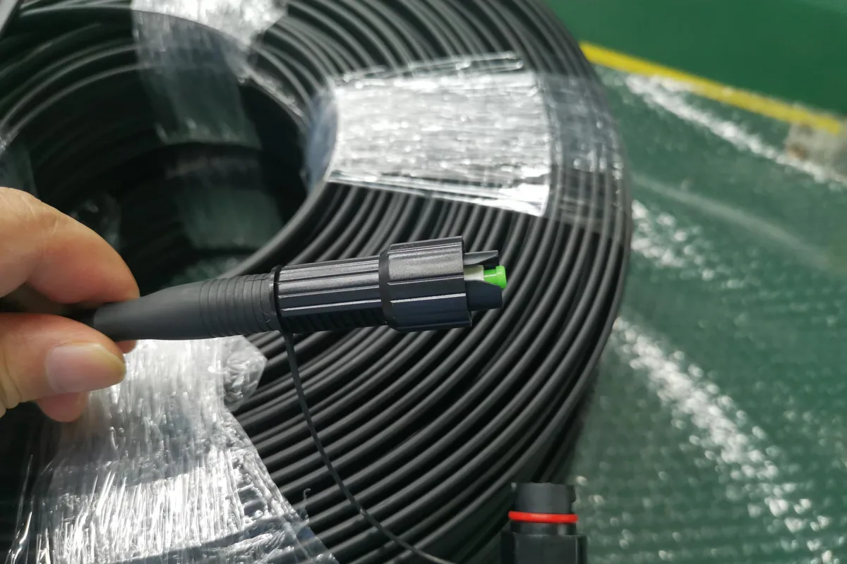 Hardened connector on a pre-connectorized FTTH drop cable