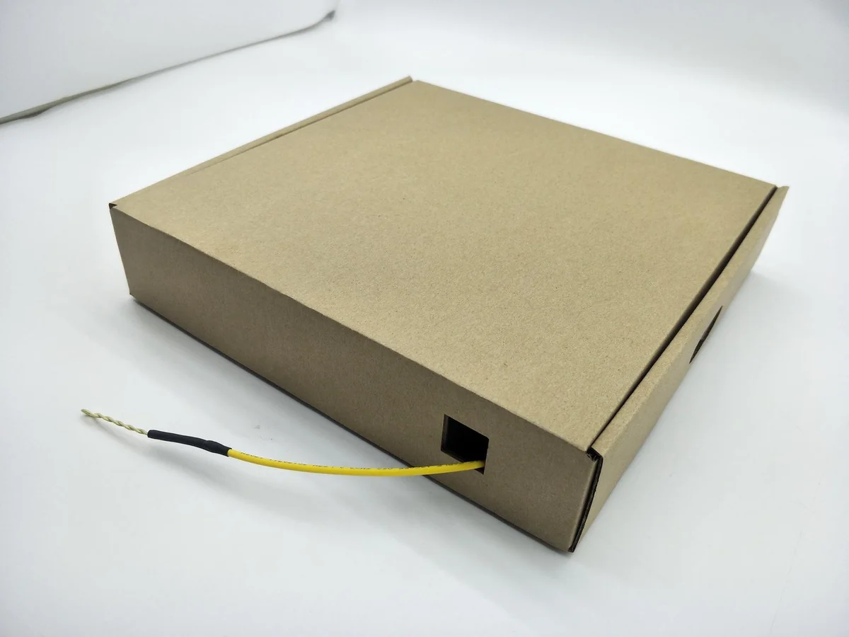 Protective shipping package for pre-terminated fiber box cable kit