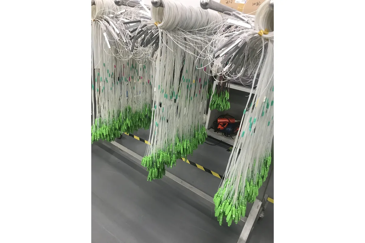 PLC splitter assemblies in a fiber optic production workshop
