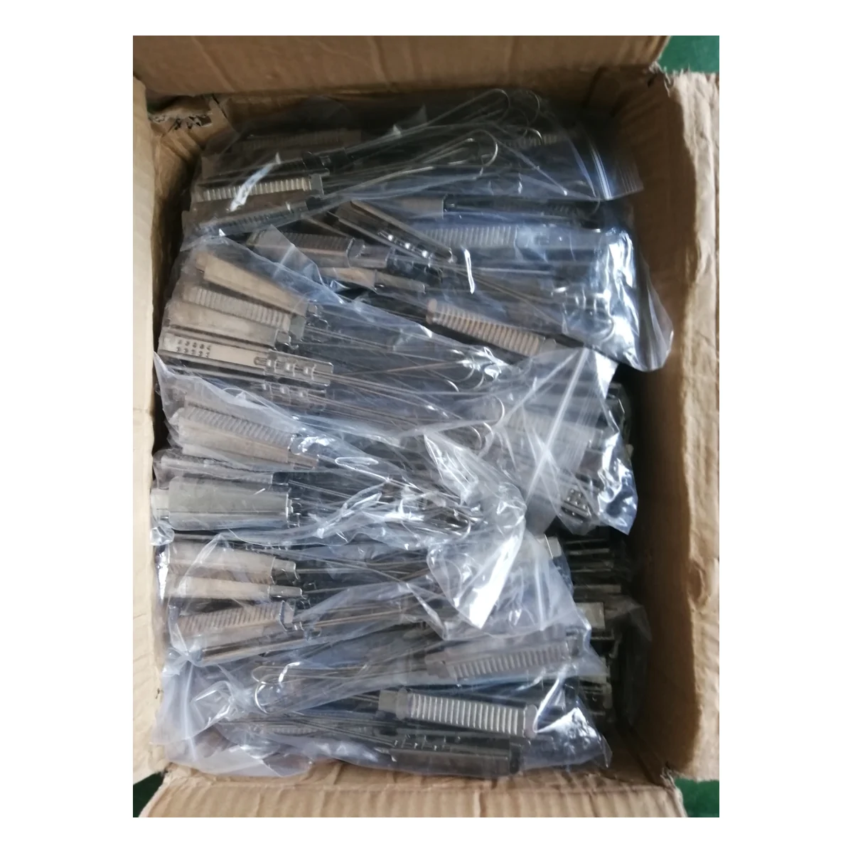 Full box packaging view of NL-DCL01 drop wire cable clamps