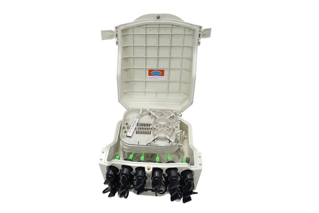 Open pre-connectorized fiber access terminal box with protected subscriber ports