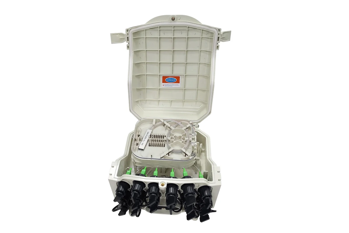 Open pre-connectorized fiber access terminal box with protected subscriber ports